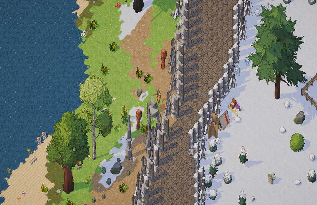 A mountain ridge: cliff faces between a lake shore and a snowfield